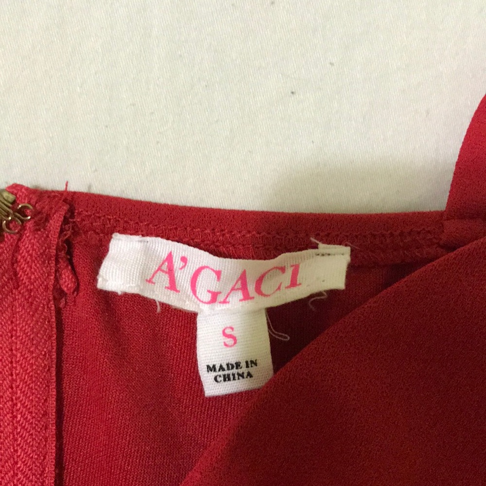 A’GACI Size small short red romper with straps !
